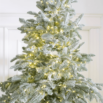 Albero di Natale Rigel innevato con LED accesi – foto 4